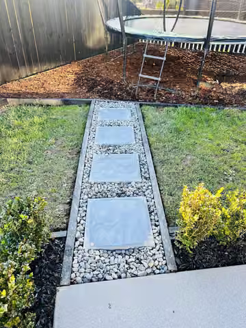 Stepping stones through a gravel garden path