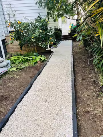 Gravel path between garden beds